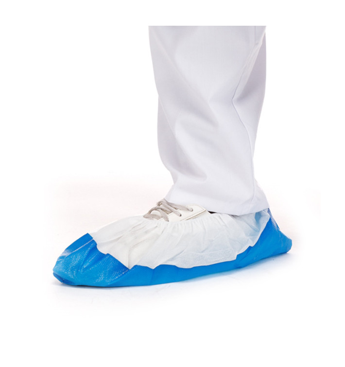Überschuhe Polypropylen mit Rutschhemmender Sohle weiß/Blau (100 Stück) Überschuhe Polypropylen mit Rutschhemmender Sohle weiß/Blau (100 Stück)